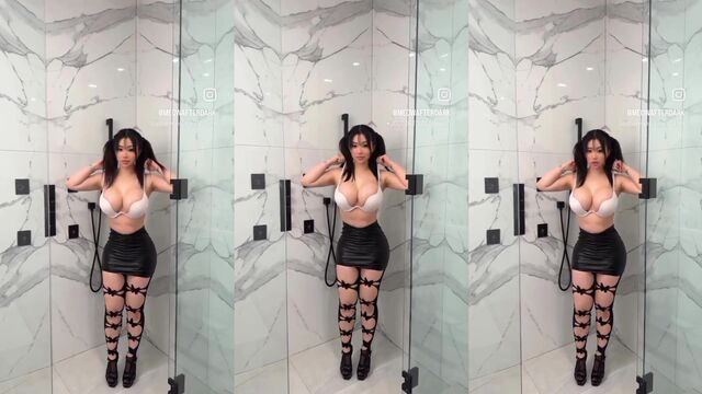 Latina with big ass shakes her booty wearing fishnet stockings