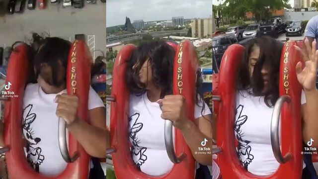 A girl has a sling shot and she uses it to ride cumming