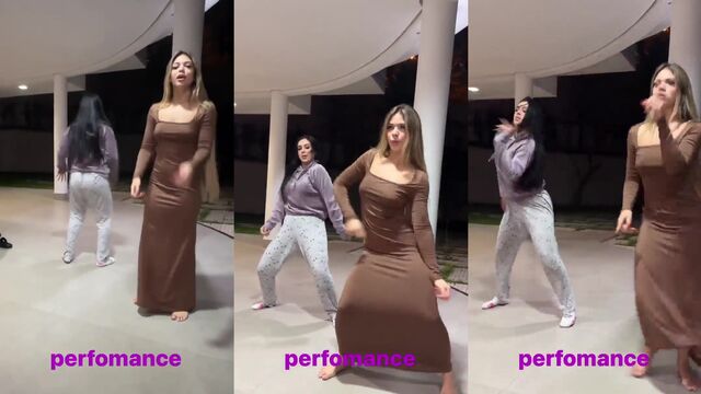 A very gostosa novinha is dancing sensually on the floor