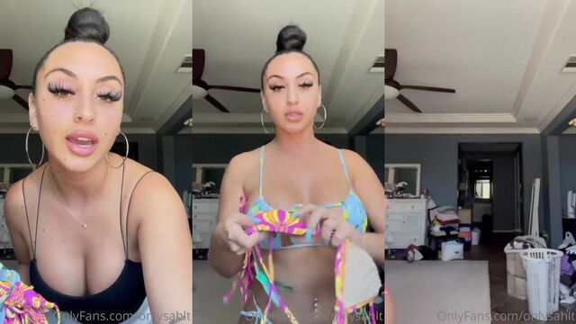 A stunning Latina babe has a big ass and fake tits to impress