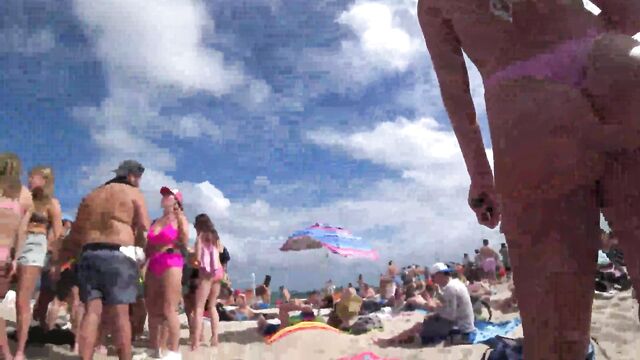 A sexy PAWG shows off her juicy ass in a thong while on the beach