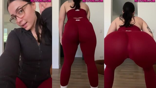 The sexy brunette in glasses teases with her big ass and dildo