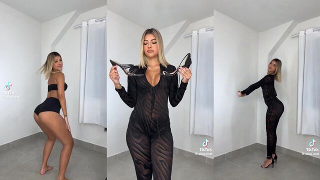 A hot brunette woman shows her sexy ass to the neighbor in the elevator