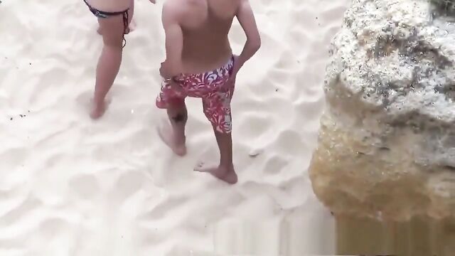 Voyeurs Watch a Couple Getting Frisky on the Public Beach
