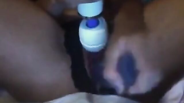 Thick ebony slut gets her pussy wet and squirts with a dildo
