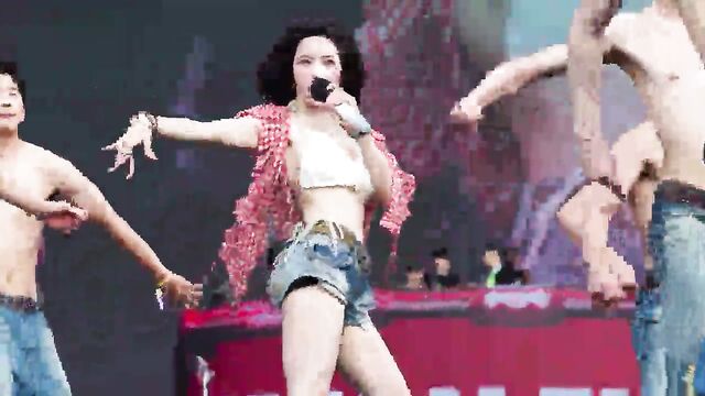 K-pop star Eunbi Kwon shows off her huge boobs on stage