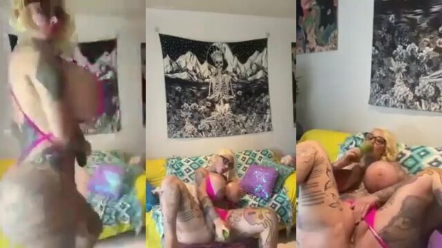 Bimbo Mary Magdalena shows off her huge fake boobs while teasing