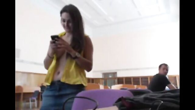 Girl masturbates in the public library, she's very bold and daring