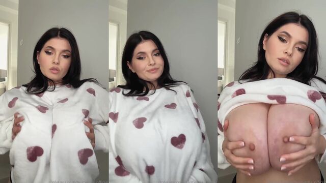 Busty MILF performs a tit drop while using a dildo