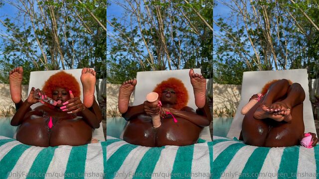 A naughty black girl has fun with a big dildo by the pool